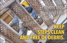 Large-format industrial facility safety banner featuring high-visibility warning graphics and text stating "Keep steps clean and free of debris".